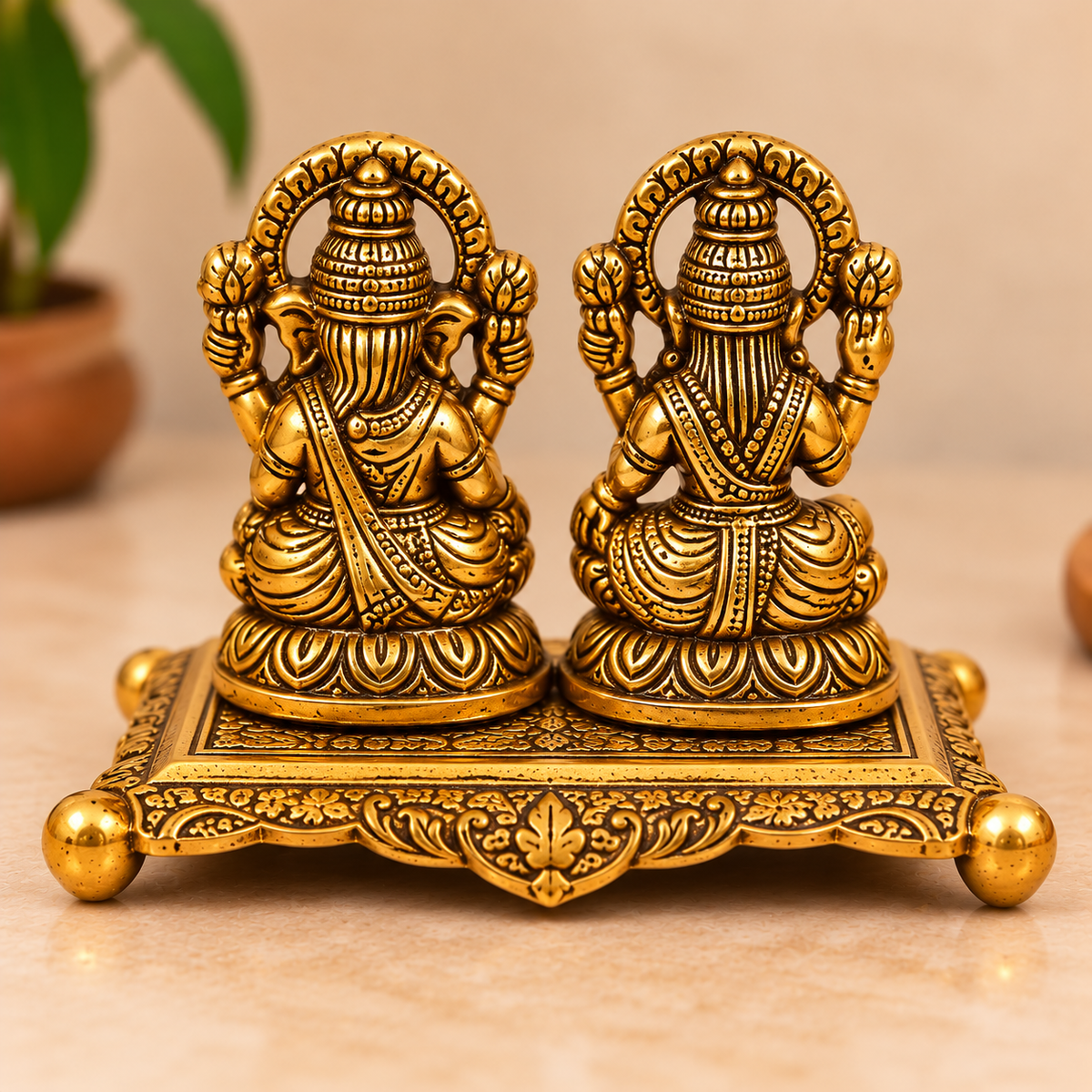 Golden Aluminium Lakshmi-Ganesha Idol with a Diya