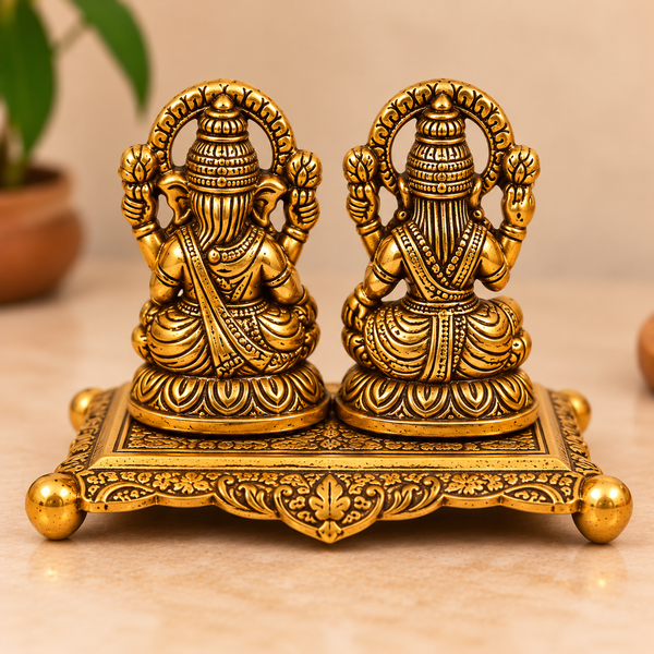 Golden Aluminium Lakshmi-Ganesha Idol with a Diya