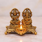 Golden Aluminium Lakshmi-Ganesha Idol with a Diya