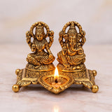 Golden Aluminium Lakshmi-Ganesha Idol with a Diya