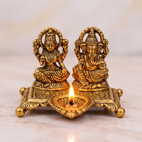 Golden Aluminium Lakshmi-Ganesha Idol with a Diya