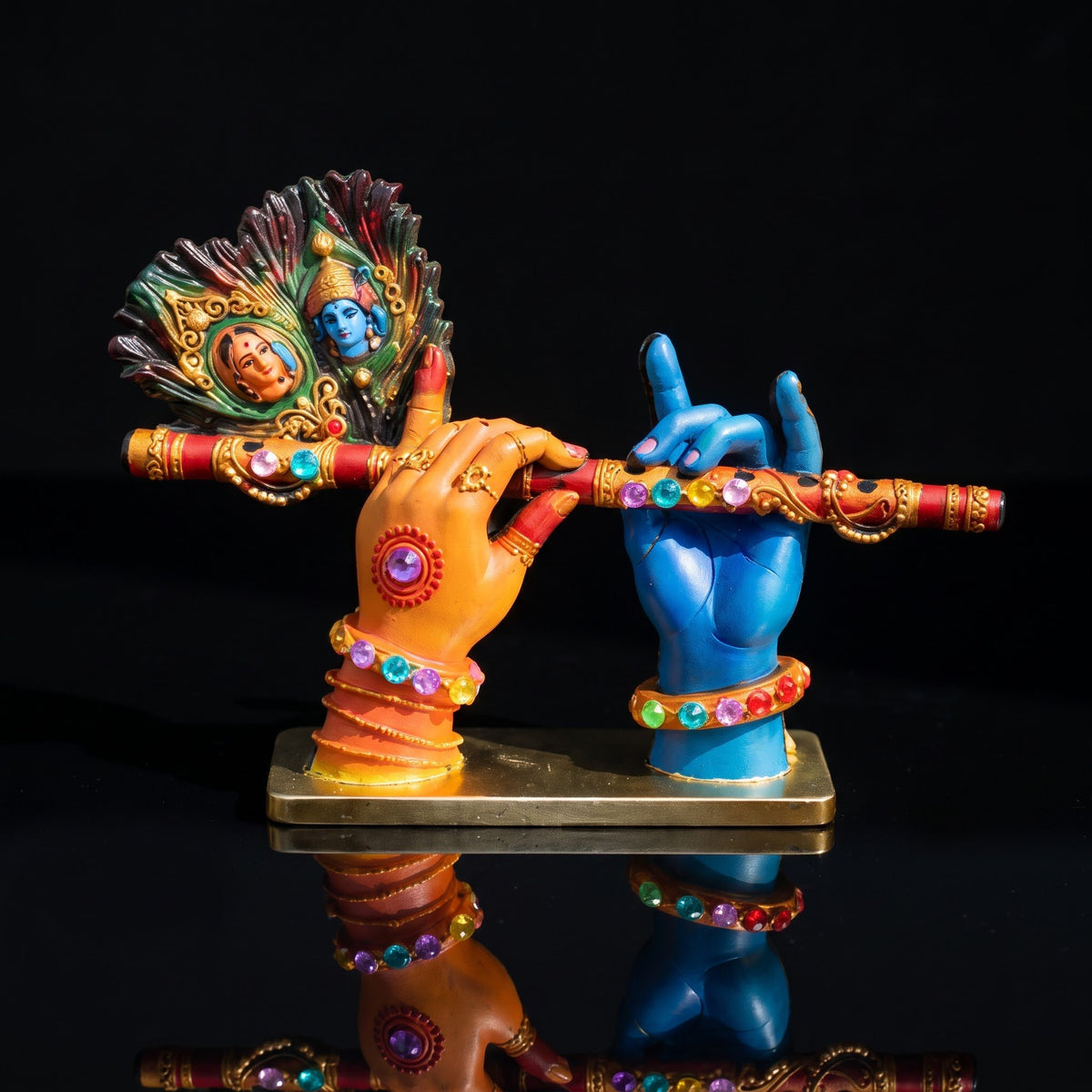 A divine idol of Radha-Krishna holding a flute