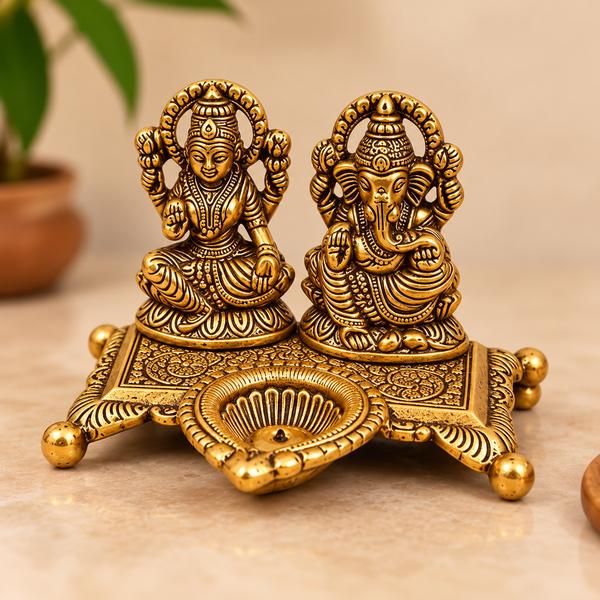 Golden Aluminium Lakshmi-Ganesha Idol with a Diya
