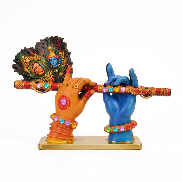 A divine idol of Radha-Krishna holding a flute