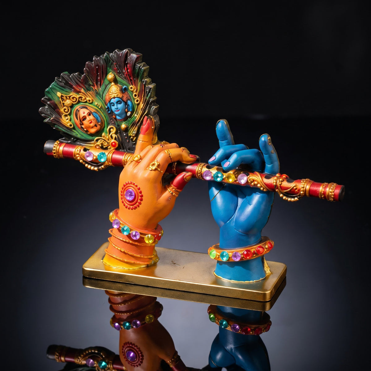 A divine idol of Radha-Krishna holding a flute